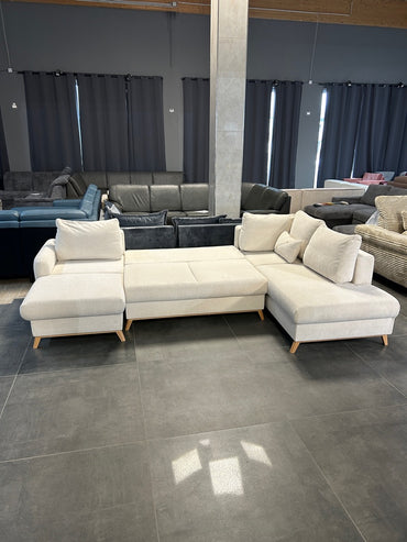 Wohnlandschaft mit Bett und Bettkasten im Nordic Look