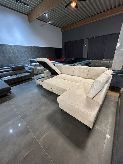 Wohnlandschaft mit Bett und Bettkasten